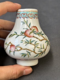 A small Chinese famille rose 'nine peaches' vase and an 'antiquities' vase, 19th C.
