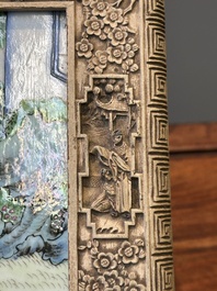A Chinese Canton carved wooden casket with a famille rose plaque, Republic