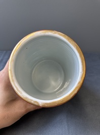 A pair of Chinese reticulated Canton famille rose brush pots, 19th C.