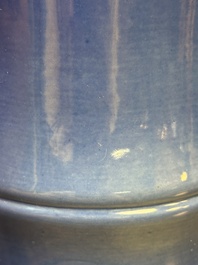 A pair of Chinese monochrome blue-glazed wall pocket vases, 19/20th C.