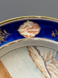 A rare Chinese Canton famille rose plate with a blue-glazed border, 19th C.