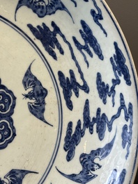 A large Chinese blue and white 'bats and longevity' dish, 19th C.