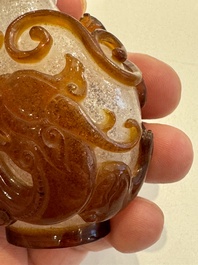A rare Chinese brown-overlay white glass snuff bottle with chilong design, Qianlong/Jiaqing