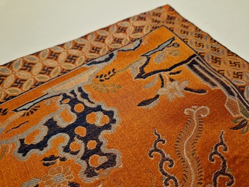 A Chinese embroidered silk 'kesi' cloth with Buddhist lions and phoenixes, 19th C.