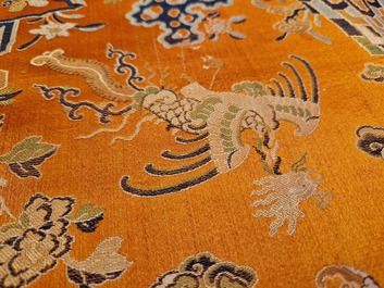 A Chinese embroidered silk 'kesi' cloth with Buddhist lions and phoenixes, 19th C.