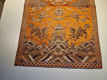 A Chinese embroidered silk 'kesi' cloth with Buddhist lions and phoenixes, 19th C.