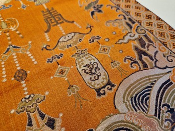 A Chinese embroidered silk 'kesi' cloth with Buddhist lions and phoenixes, 19th C.