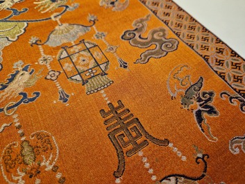 A Chinese embroidered silk 'kesi' cloth with Buddhist lions and phoenixes, 19th C.