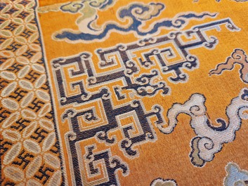 A Chinese embroidered silk 'kesi' cloth with Buddhist lions and phoenixes, 19th C.