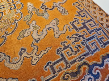A Chinese embroidered silk 'kesi' cloth with Buddhist lions and phoenixes, 19th C.
