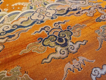A Chinese embroidered silk 'kesi' cloth with Buddhist lions and phoenixes, 19th C.