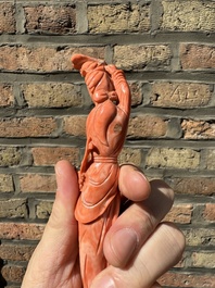 A Chinese red coral figure of a lady holding a fan and a phoenix, 19/20th C.