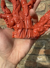 A Chinese red coral group of ladies with playing children on wooden stand, 19/20th C.