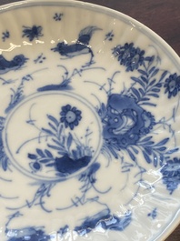 A collection of 15 Chinese blue and white cups and 19 saucers, Kangxi/Yongzheng