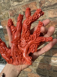 A Chinese red coral group of ladies with playing children on wooden stand, 19/20th C.