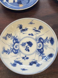 A collection of 15 Chinese blue and white cups and 19 saucers, Kangxi/Yongzheng