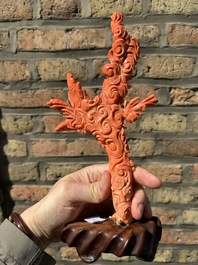 A Chinese red coral figure of Xiwangmu on wooden stand, 19/20th C.