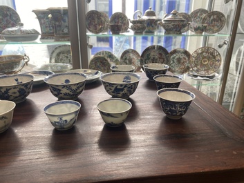 A collection of 15 Chinese blue and white cups and 19 saucers, Kangxi/Yongzheng