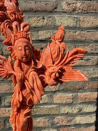 A Chinese red coral figure of Xiwangmu on wooden stand, 19/20th C.