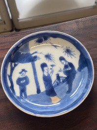 A collection of 15 Chinese blue and white cups and 19 saucers, Kangxi/Yongzheng