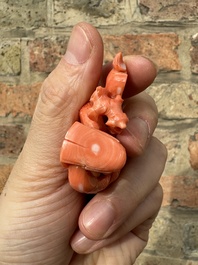 A set of seven Chinese red coral figures on wooden stand, 19/20th C.
