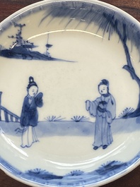 A collection of 15 Chinese blue and white cups and 19 saucers, Kangxi/Yongzheng