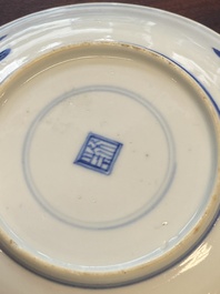A collection of 15 Chinese blue and white cups and 19 saucers, Kangxi/Yongzheng