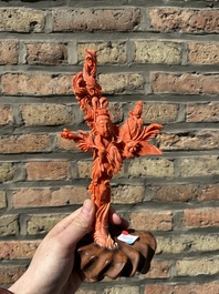 A Chinese red coral figure of Xiwangmu on wooden stand, 19/20th C.