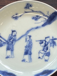 A collection of 15 Chinese blue and white cups and 19 saucers, Kangxi/Yongzheng