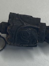 Four Tibetan bronze and wooden phurbas, a 'kapala' or skull-bowl, a pair of brass tingsha and two silver ornaments,  19th C.