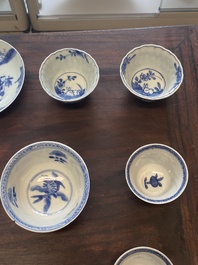 A collection of 15 Chinese blue and white cups and 19 saucers, Kangxi/Yongzheng