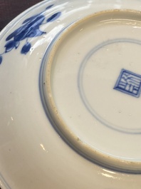 A collection of 15 Chinese blue and white cups and 19 saucers, Kangxi/Yongzheng