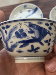 A collection of 15 Chinese blue and white cups and 19 saucers, Kangxi/Yongzheng