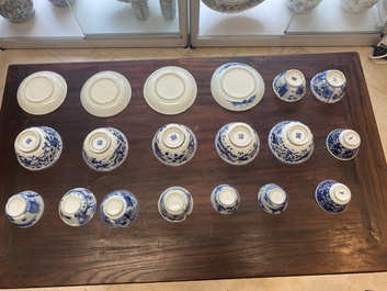 A collection of 15 Chinese blue and white cups and 19 saucers, Kangxi/Yongzheng