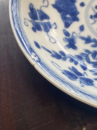 A collection of 15 Chinese blue and white cups and 19 saucers, Kangxi/Yongzheng