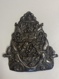 Four Tibetan bronze and wooden phurbas, a 'kapala' or skull-bowl, a pair of brass tingsha and two silver ornaments,  19th C.