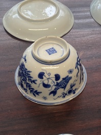 A collection of 15 Chinese blue and white cups and 19 saucers, Kangxi/Yongzheng