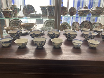 A collection of 15 Chinese blue and white cups and 19 saucers, Kangxi/Yongzheng