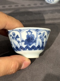 Thirteen Chinese blue and white saucers and twelve cups with figural design, Kangxi/Yongzheng