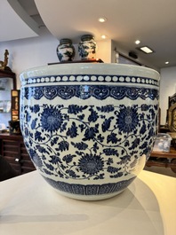 A large Chinese blue and white 'peony scroll' fish bowl, Qianlong/Jiaqing