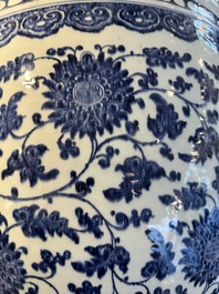 A large Chinese blue and white 'peony scroll' fish bowl, Qianlong/Jiaqing