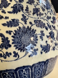 A large Chinese blue and white 'peony scroll' fish bowl, Qianlong/Jiaqing