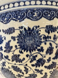 A large Chinese blue and white 'peony scroll' fish bowl, Qianlong/Jiaqing