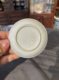 Thirteen Chinese blue and white saucers and twelve cups with figural design, Kangxi/Yongzheng