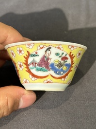 Five Chinese famille rose yellow-ground cups and saucers with 'four arts 四藝' design, Yongzheng