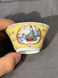 Five Chinese famille rose yellow-ground cups and saucers with 'four arts 四藝' design, Yongzheng