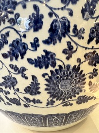 A large Chinese blue and white 'peony scroll' fish bowl, Qianlong/Jiaqing