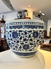 A large Chinese blue and white 'peony scroll' fish bowl, Qianlong/Jiaqing