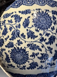 A large Chinese blue and white 'peony scroll' fish bowl, Qianlong/Jiaqing