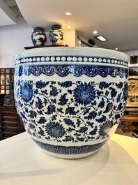 A large Chinese blue and white 'peony scroll' fish bowl, Qianlong/Jiaqing
